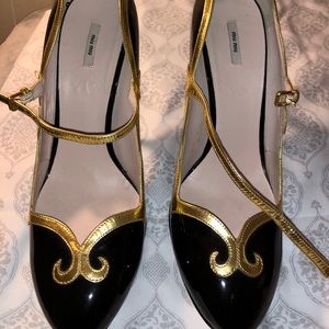 MIU MIU BLACK & GOLD HEELS